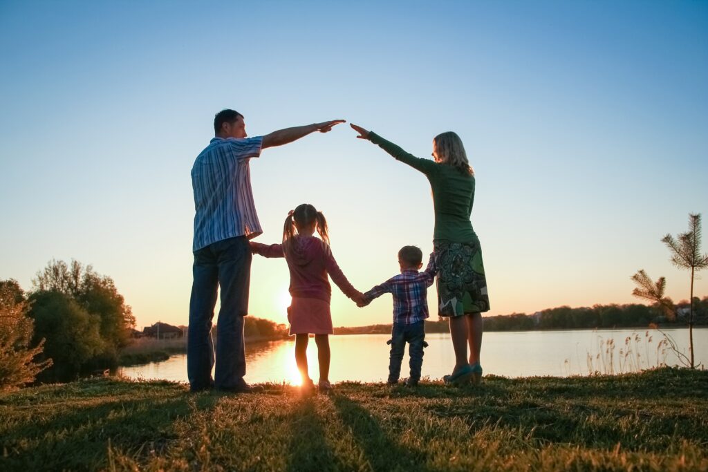 Silhouette,Family,,Including,His,Father,,Mother,And,Two,Children,In